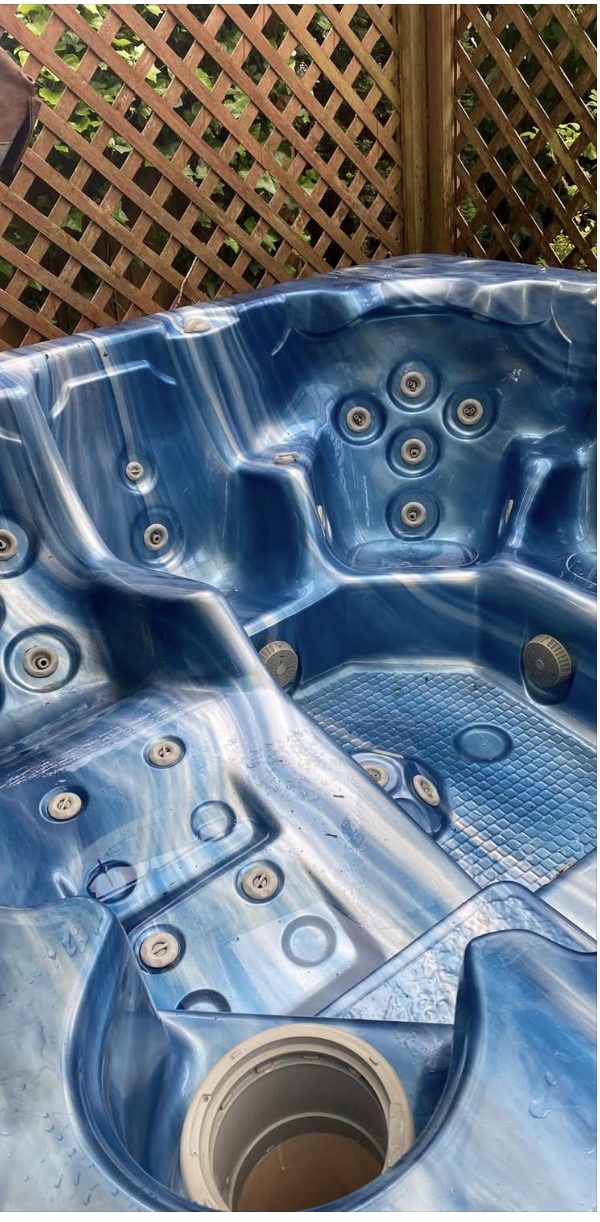 Empty hot tub before deep clean and refill